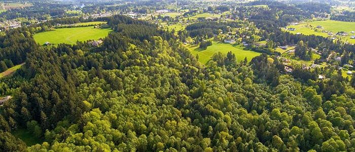 Happy Valley has rolling hills, farmland and forests