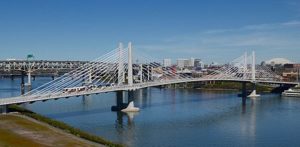 Tilikum_Crossing_from_Ross_Island_Bridge_with_MAX